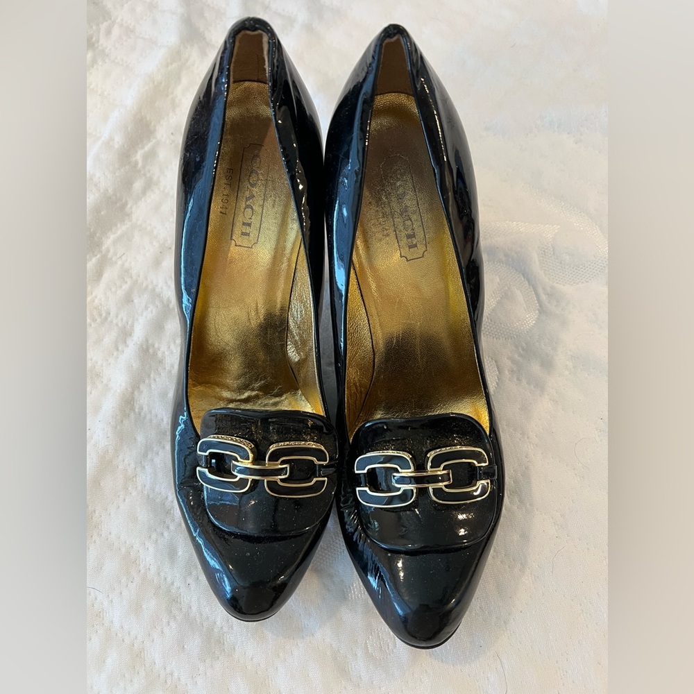 COACH women’s patent leather heels, enamel detail logo